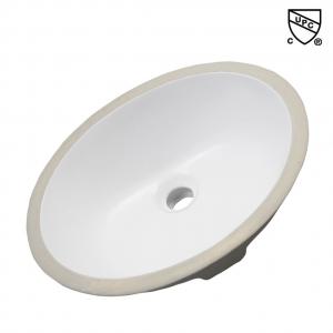 China Oval Shape Undermount Bathroom Sink Fine Fireclay Construction One Piece Wash Basin wholesale