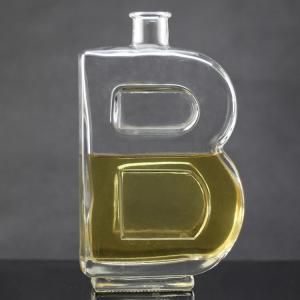 China Base Material Glass Bottle with Unique Letter Shape and Cork Cap wholesale
