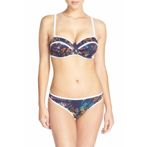 Quality White trim highlights the vibrant floral print set against the dark backdrop of a stylish bikini for sale