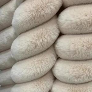 China Orange Cream Fluffy Fabric Material Blanket Fuzzy Upholstery Fabric wholesale