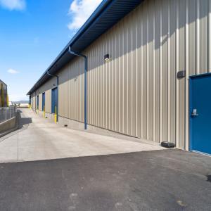 China Tekla Pkpm Auto CAD Design Larger Span Modern Heavy Steel Structure Frame Workshop Garage Hangar on sale