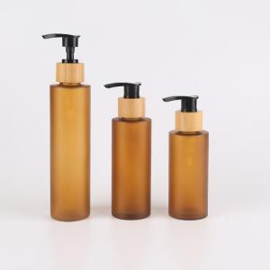 China 120ml 150ml 200ml Amber Plastic Shampoo Bottles With Pump Bamboo Skincare Packaging wholesale