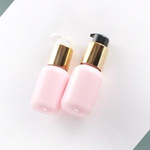 China 60ml Pink Round Cosmetic Lotion Bottle Electroplating Golden Pump wholesale