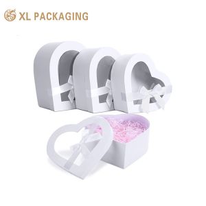 China Custom White Red Pink Cardboard Heart Shaped Paper Flower Carton Jewelry Chocolate Gift Packaging Box With Clear Window on sale