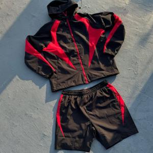 China Custom Nylon Windbreaker Short Set Hoodie and Shorts Tracksuit Suit Plaid Pleated Fabric 2 Piece Zip up Jacket and Shorts Set on sale