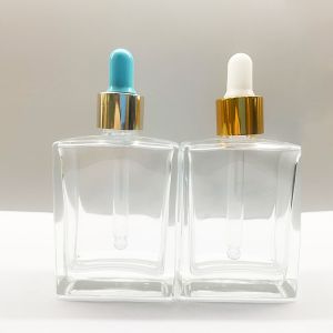 China OEM 50ml 100ml Cosmetic Dropper Bottles With Gold Shinny Collar on sale