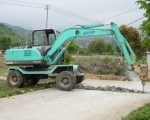 China Four Wheel Drive Wheeled Excavator With Breaker Hammer Light Blue wholesale