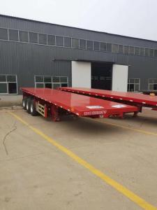 China New Tri-Axle  40 Tons  Foot Container Chassis Flatbed Semi Trucks Trailer wholesale