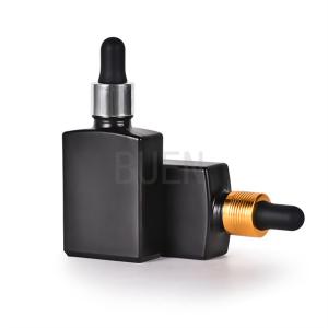 China Cosmetic Packaging Glass Dropper Bottle Frosted Black Customized wholesale