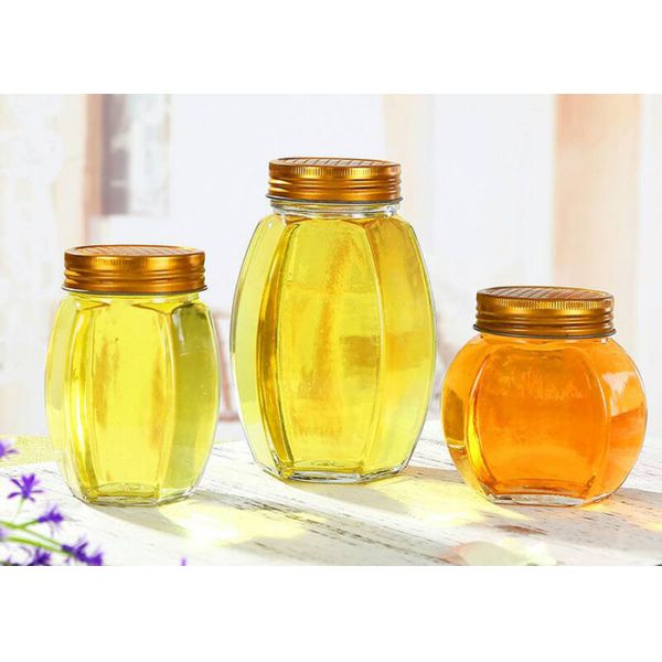 Oval Hexagonal Glass Honey Jars Transparent Color Moistureproof Feature