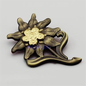 China Customized three-dimensional flower metal OEM, high-end furniture brand badges, edelweiss antique badge on sale
