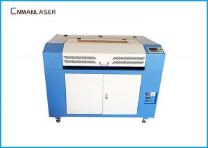 6090 Portable Auto feeding Laser Engraving Cutting Machine Working on  Acrylic Wood