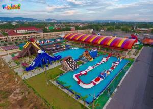 China Large Floating Water Parks Rentals 150m Inflatable Water Slides wholesale