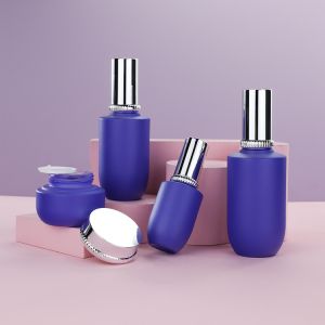 China Custom Purple Empty Cosmetic Packaging 30ml-120ml Luxury Cosmetic Bottles on sale