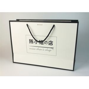 Buy cheap Portable paper bag custom printed logo gift bag advertising white card paper bag from wholesalers